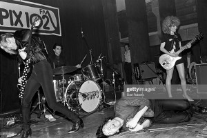 (MANDATORY CREDIT Ebet Roberts/Getty Images) NEW YORK - JUNE 18: The Cramps perform live on stage at Club 57, New York on June 18 1979. L-R Bryan Gregory, Nick Knox, Lux Interior (lying down) and Poison Ivy (Photo by Ebet Roberts/Redferns)